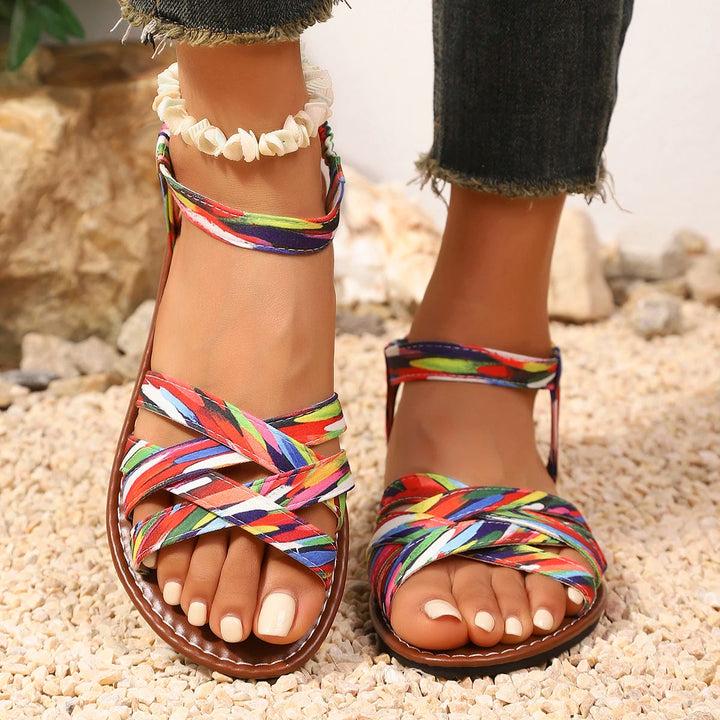 Pair of versatile unisex summer sandals, ideal for diverse warm-weather outfits and travel comfort.
