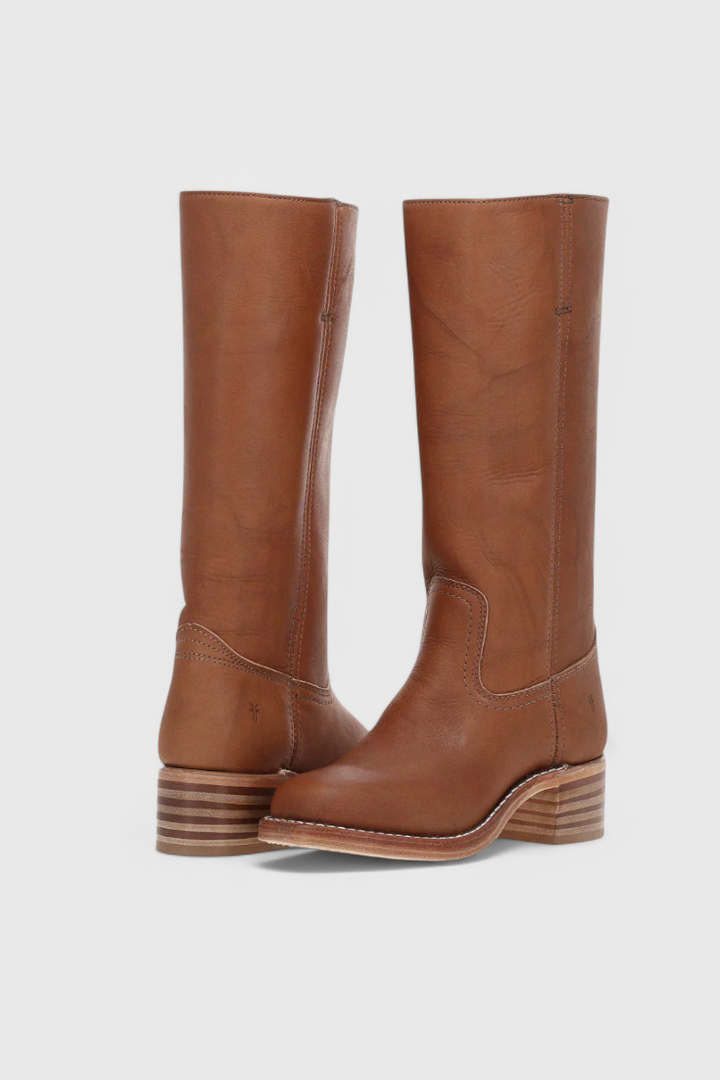 Stylish women's slip-on knee-high boots, featuring a comfortable heel for all-day wear.