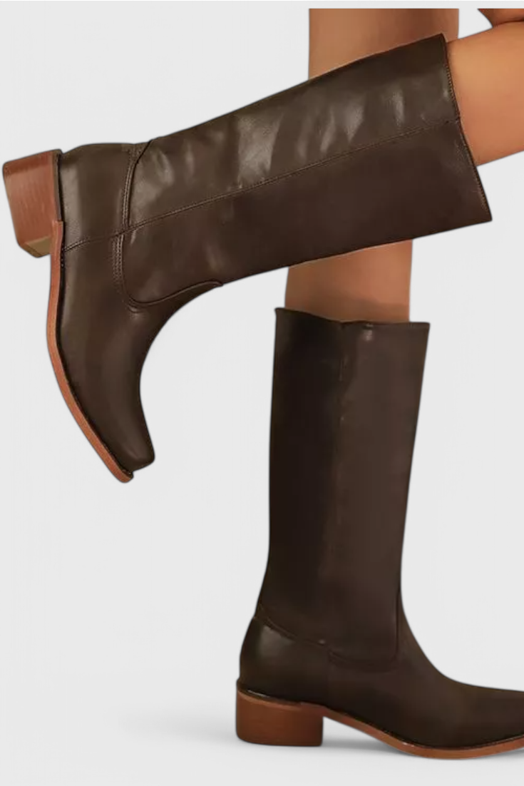 Elegant women's knee-high heeled leather boots, perfect for stylish autumn & winter fashion.