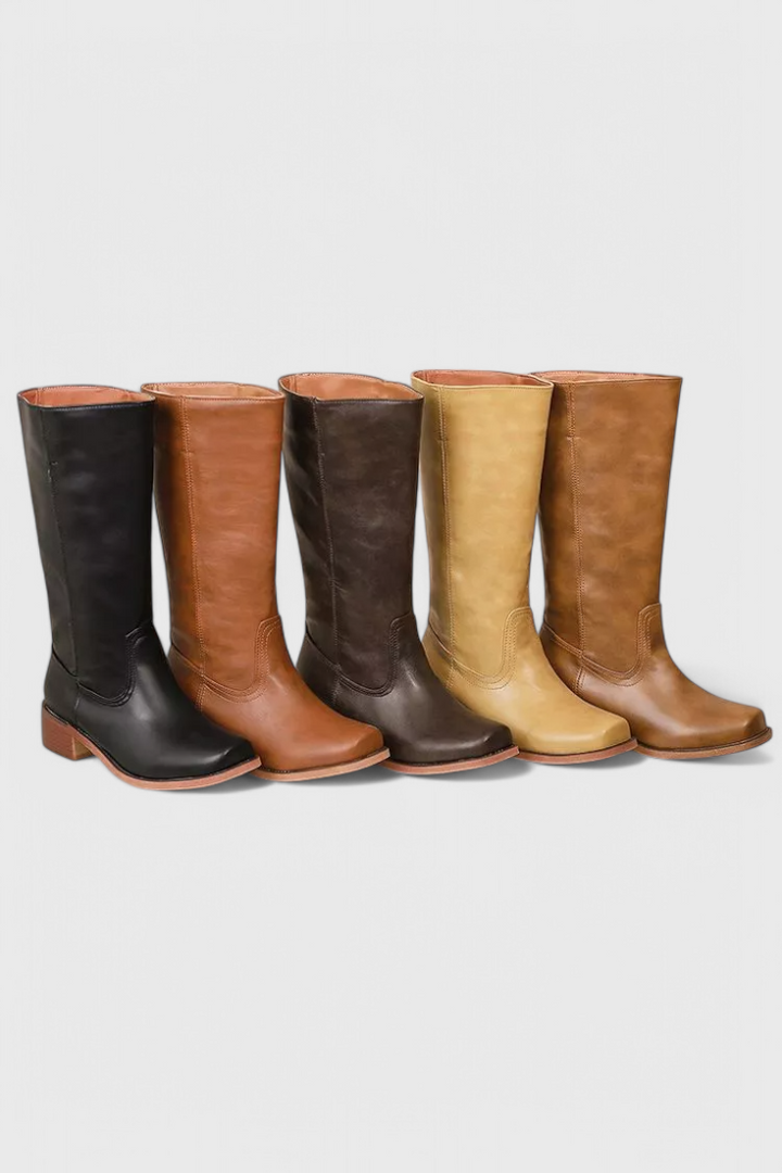 Fashionable ladies' knee-high leather boots, heeled, offering superior comfort and style.