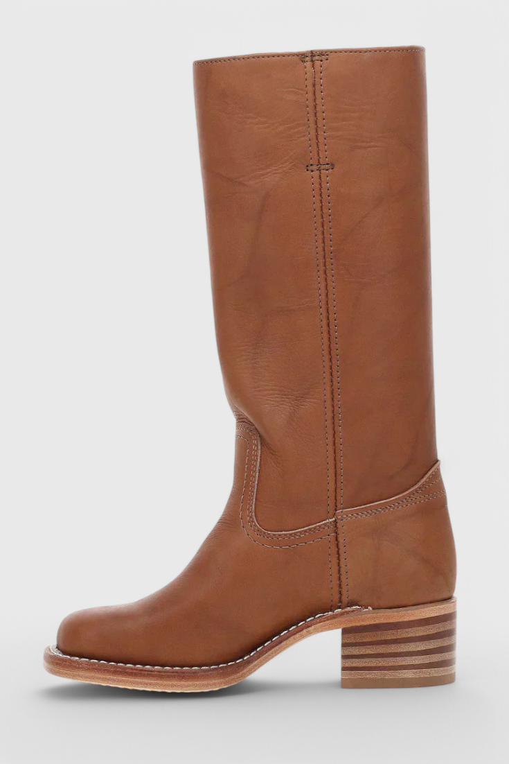 Chic women's knee-high boots with a stylish heel, perfect for both casual and formal wear.