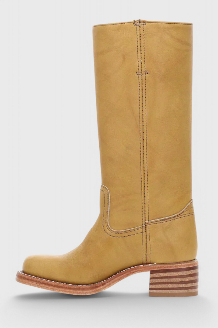 Stylish women's winter boots, knee-high with a comfortable heel, perfect for cozy elegance.