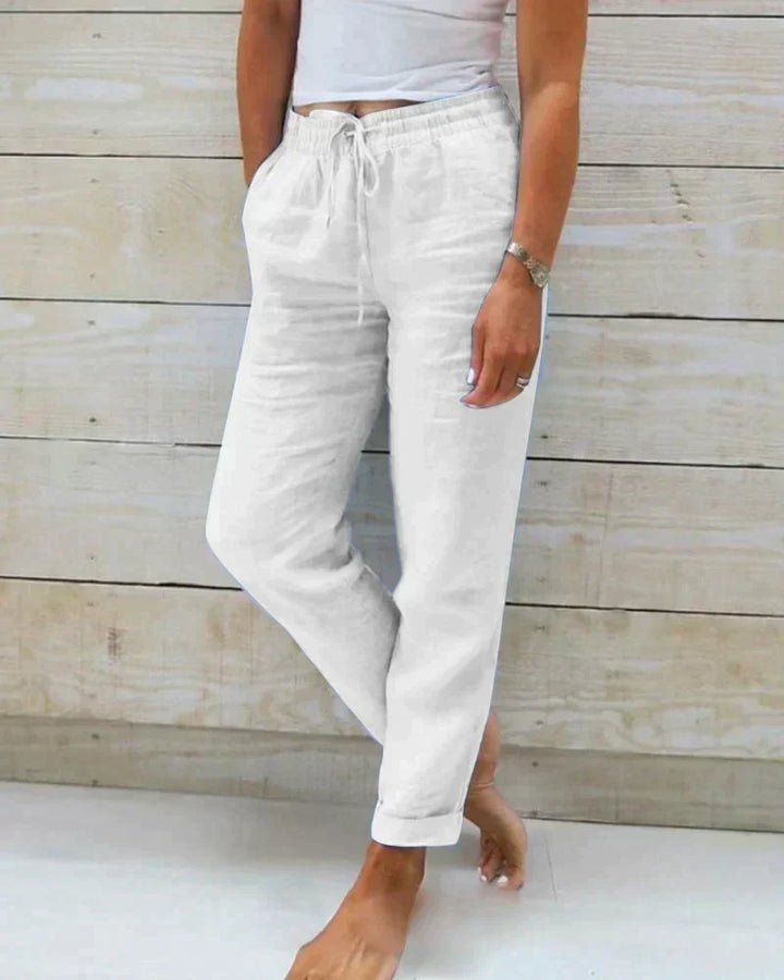 Elegant women's wide-leg pants with a relaxed fit. Ideal for comfortable summer style and versatile fashion.