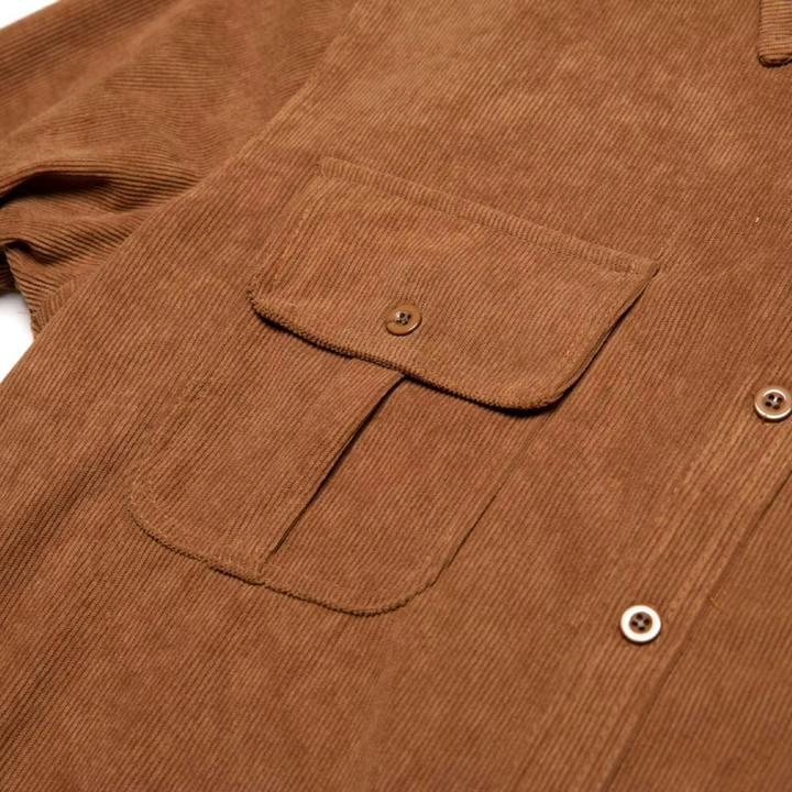 Men's everyday long sleeve shirt. Casual button-front with chest pockets, perfect for versatile outfits.