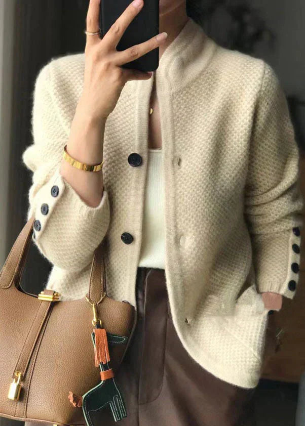 Luxurious women's cozy knit cardigan with elegant stand collar & button front, perfect for winter warmth.
