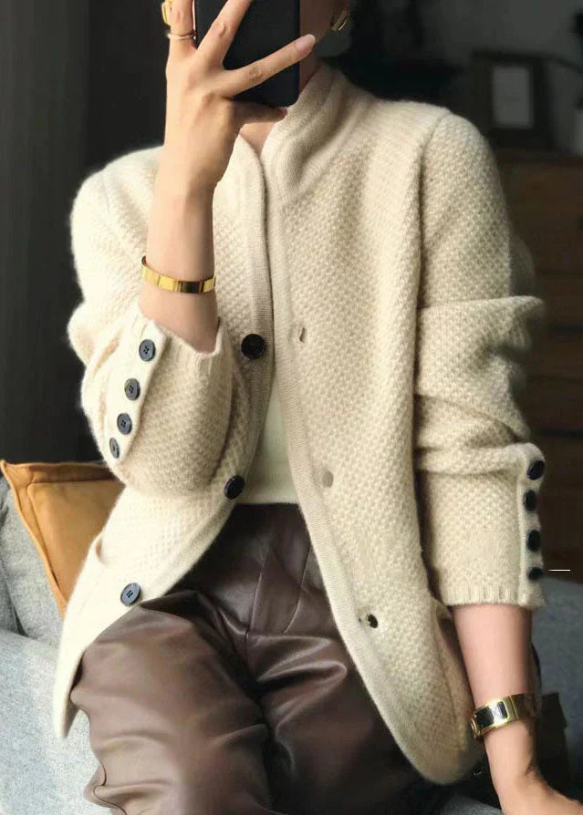 Elegant women's warm sweater cardigan featuring a sophisticated stand collar and classic buttons, ideal for chic style.