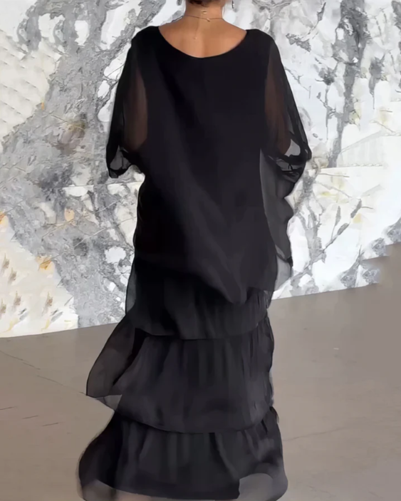 Women's long sleeve tiered maxi dress, a relaxed and elegant piece, perfect for a chic everyday look.
