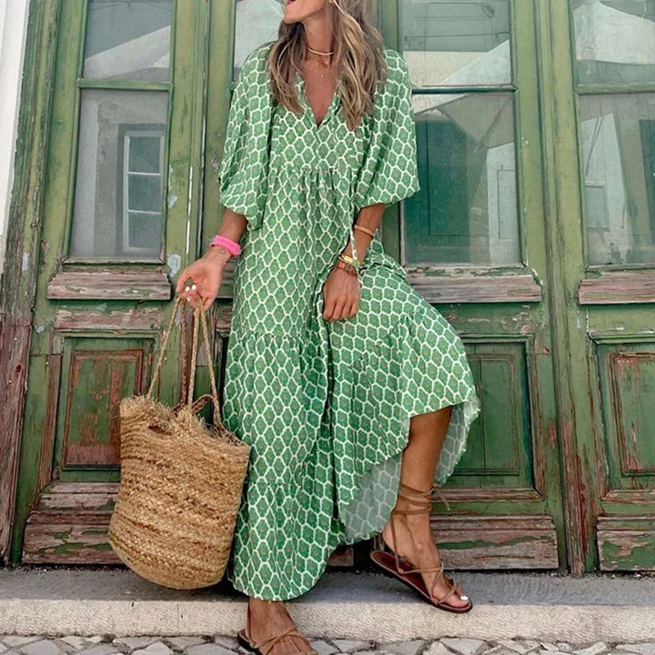 Elegant women's boho maxi dress with puff sleeves & V-neck. Flowy green summer dress, perfect for holidays & casual wear.