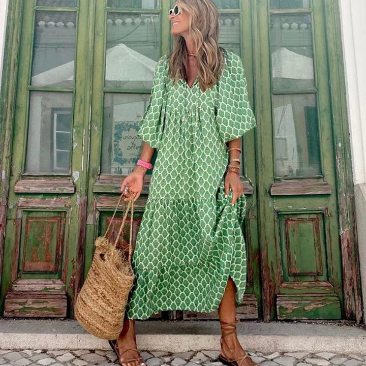 Blue versatile boho maxi dress for women, featuring elegant puff sleeves & a V-neck. Ideal casual or holiday summer fashion.