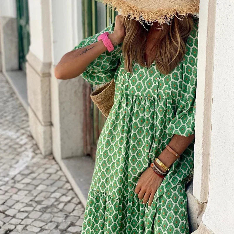 Flowy green women's summer dress, an elegant boho maxi with comfortable puff sleeves & a flattering V-neck. Holiday vibes.