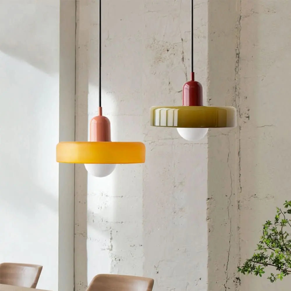 Bauhaus inspired colored glass pendant light for modern interiors.