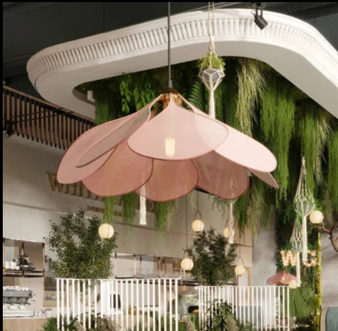 Close-up of an elegant flower pendant light, showcasing intricate petals and natural design for modern home decor.