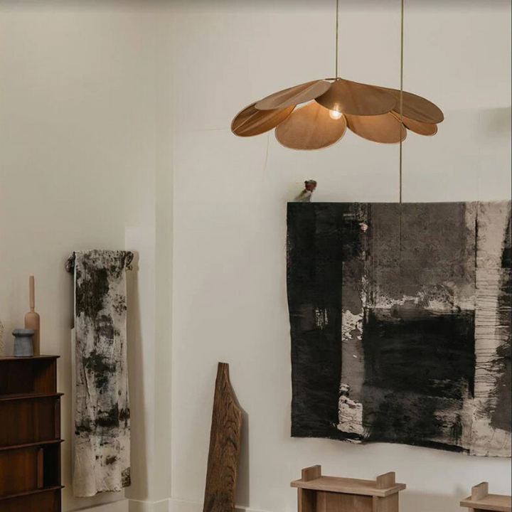 Modern flower pendant light featuring a unique natural design, a stylish fabric & metal fixture for home decor.