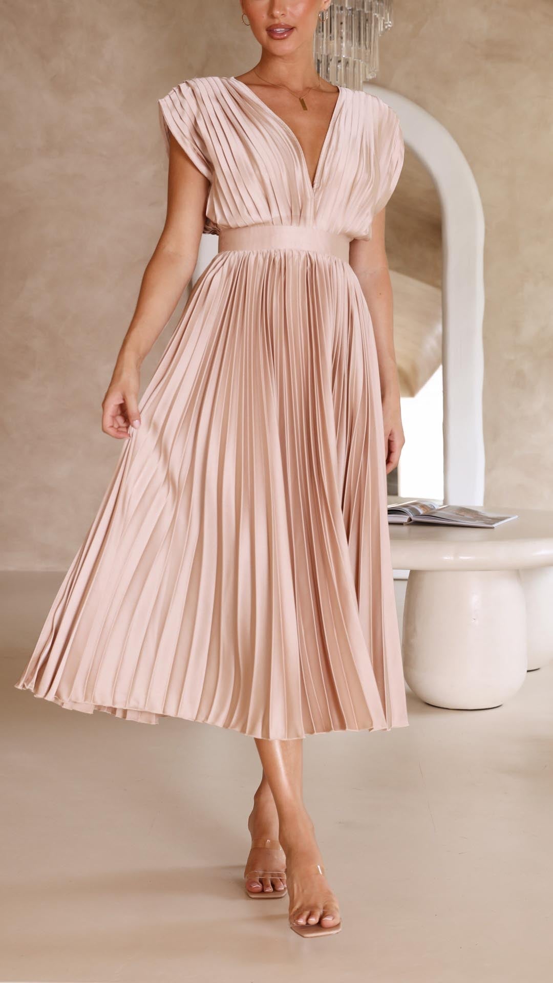 Chic pleated evening gown for women, elegant long dress style.