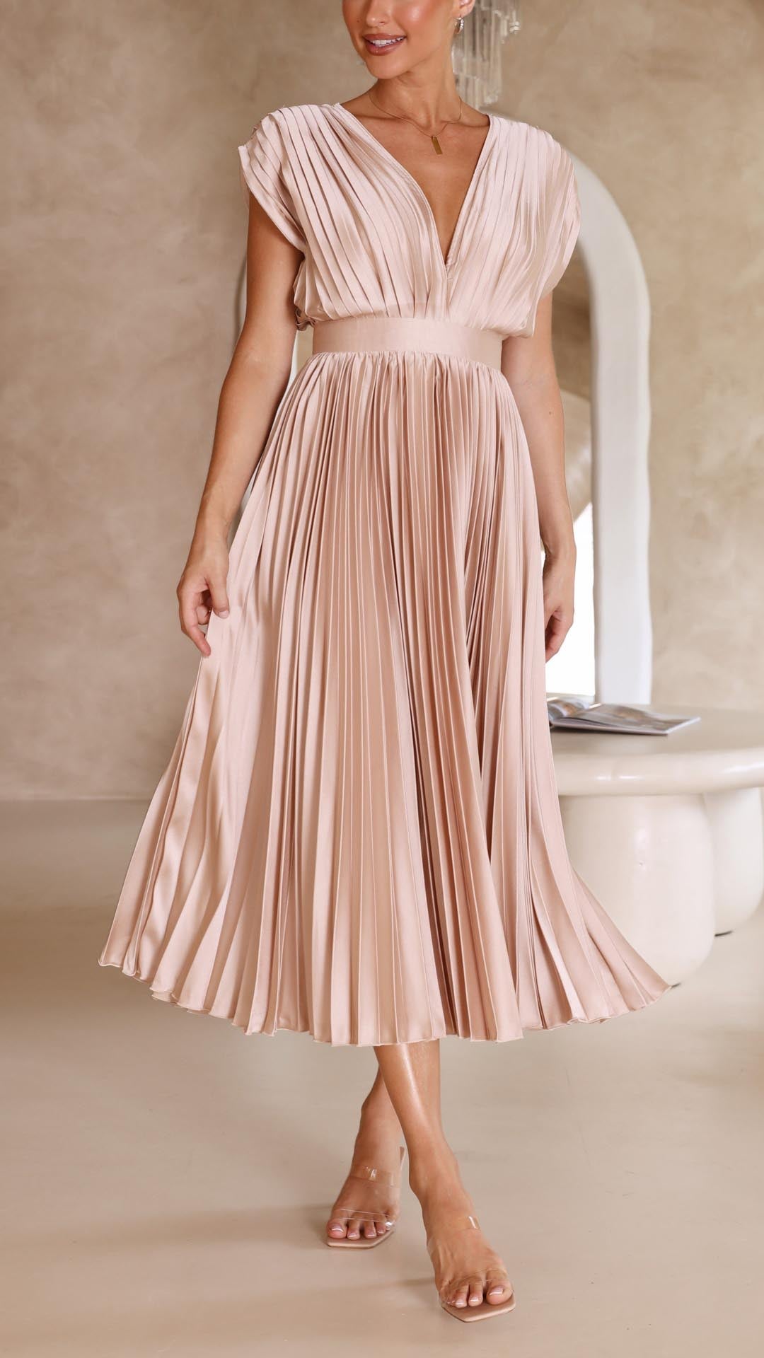 Timeless women's flowing maxi dress, elegant pleated design.