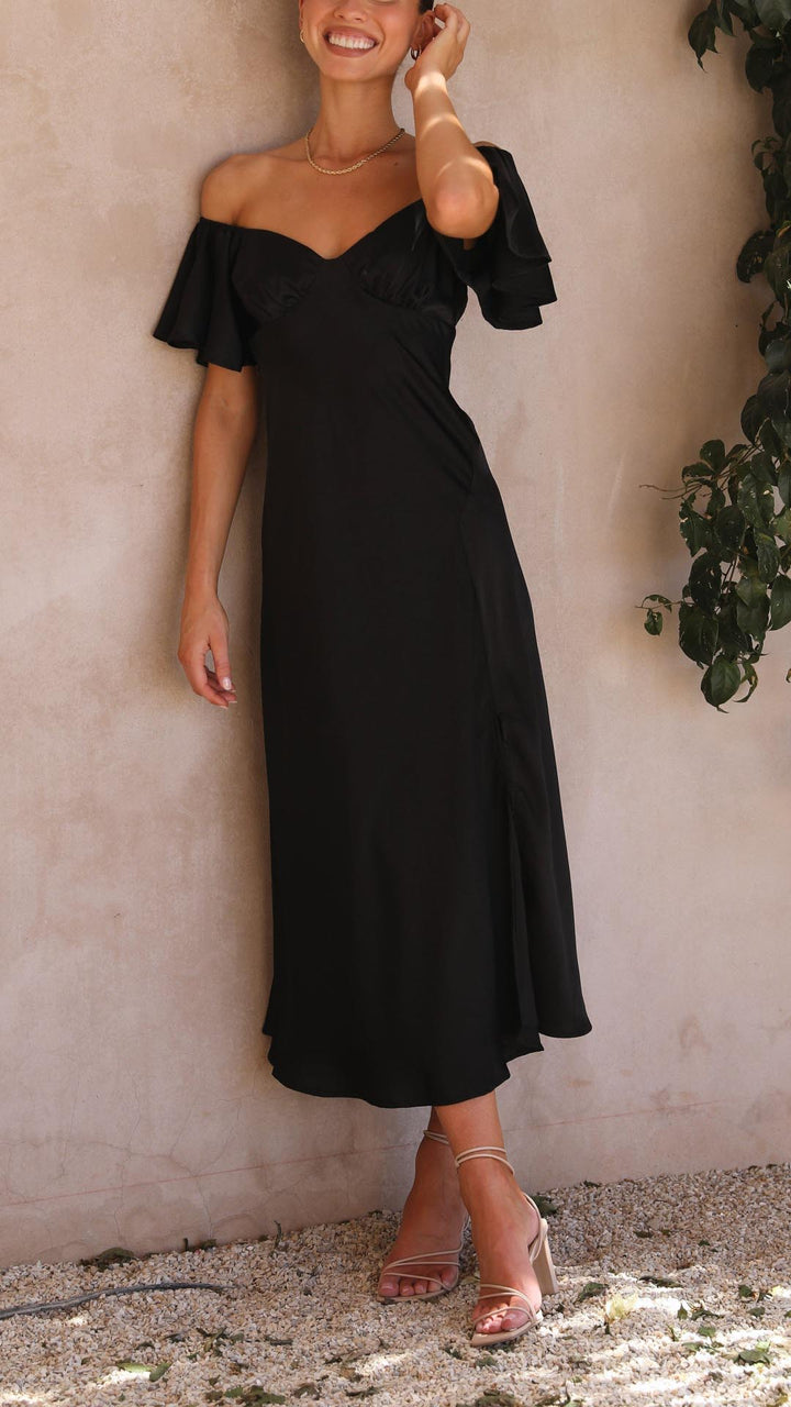 Women's off-shoulder elegant maxi dress with flowy butterfly sleeves, suitable for evening wear.