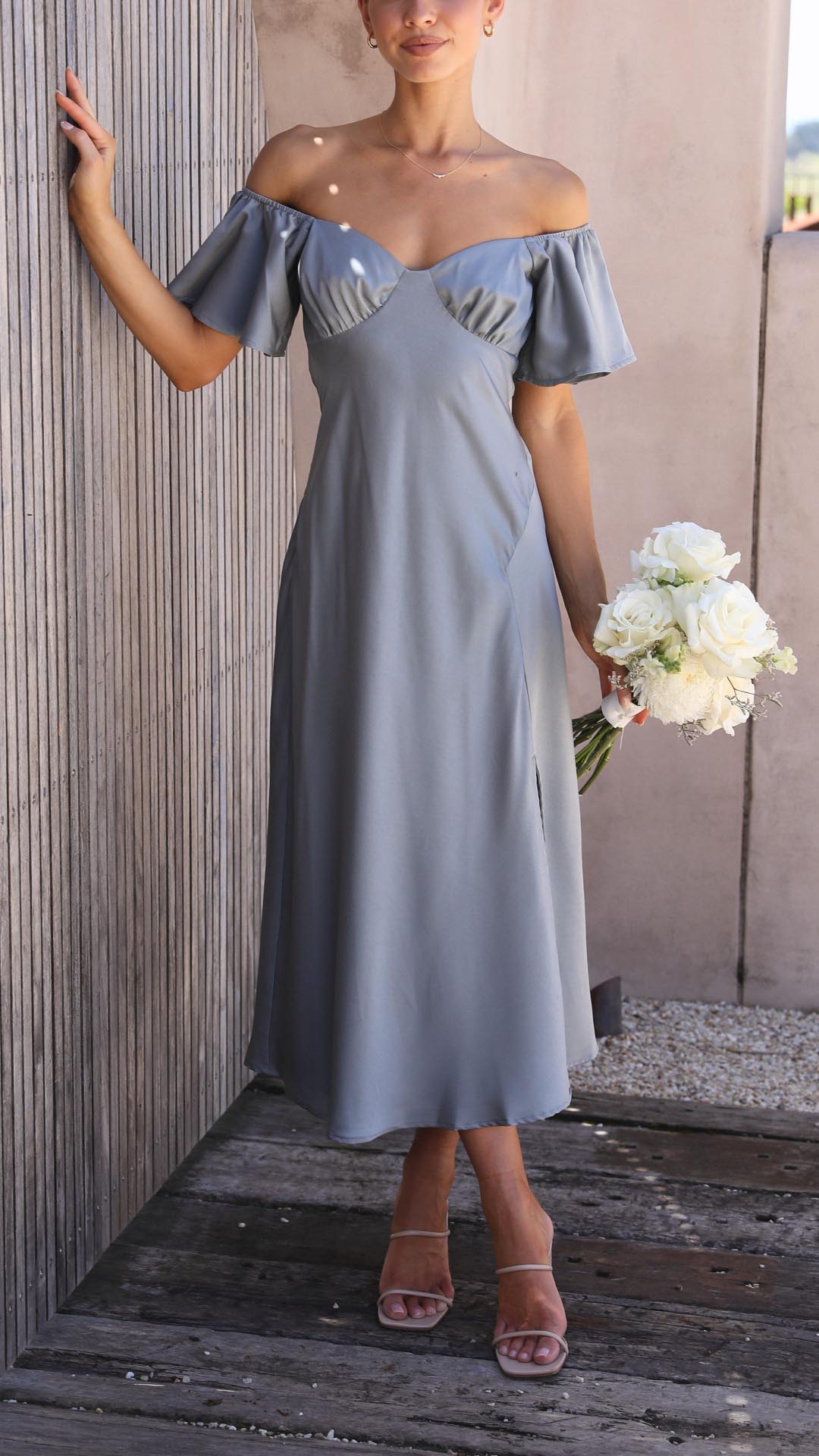 Beautiful off-shoulder evening maxi dress for women, featuring delicate butterfly sleeves.