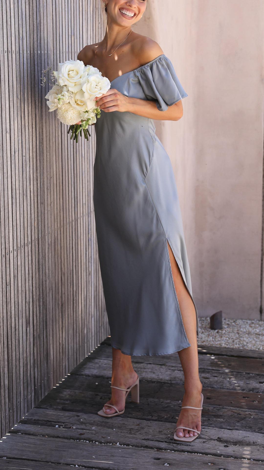 Stylish women's off-shoulder long dress, complete with elegant butterfly sleeves for special events.