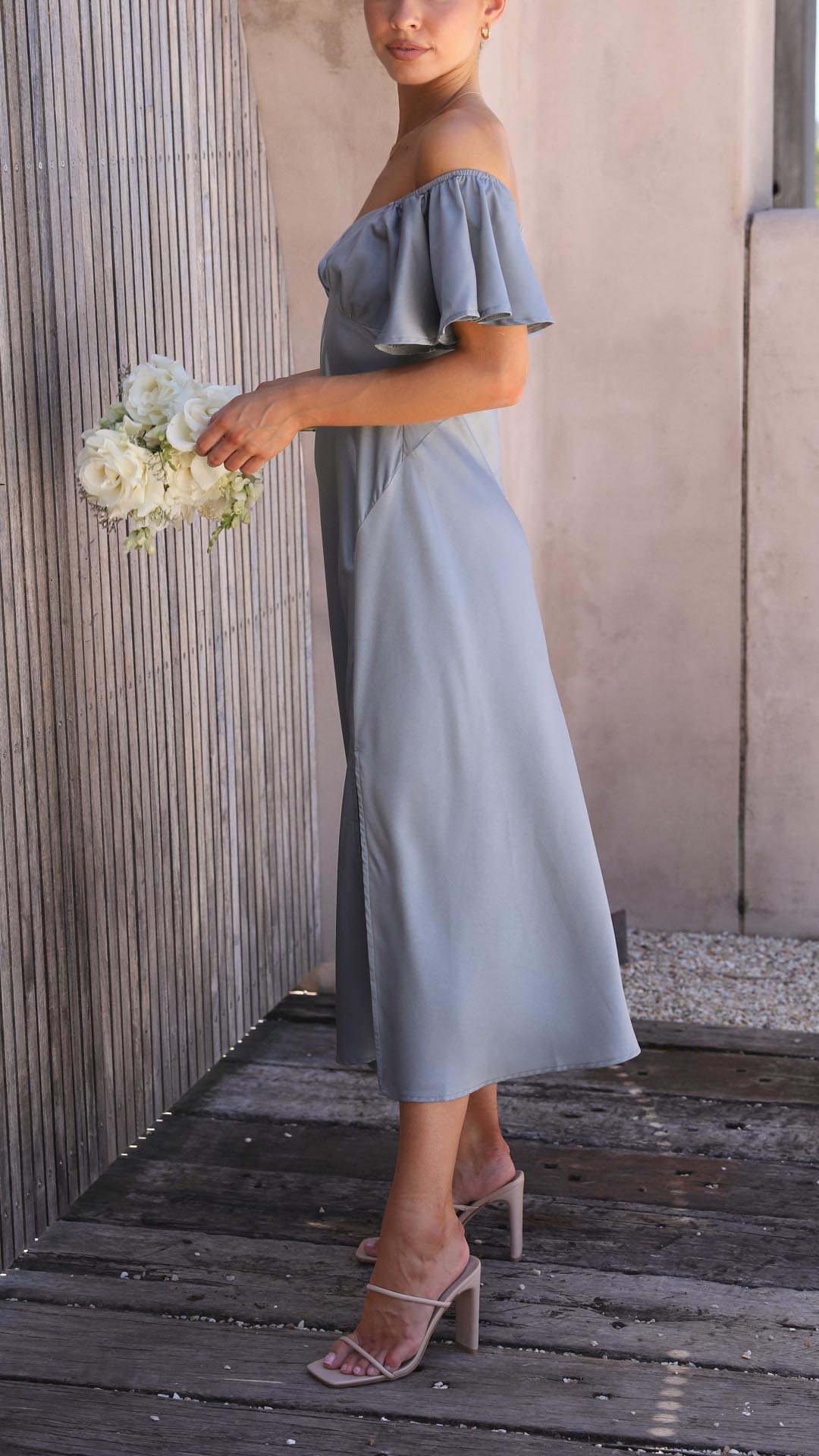 Versatile women's off-shoulder maxi dress, showcasing beautiful butterfly sleeves for any occasion.
