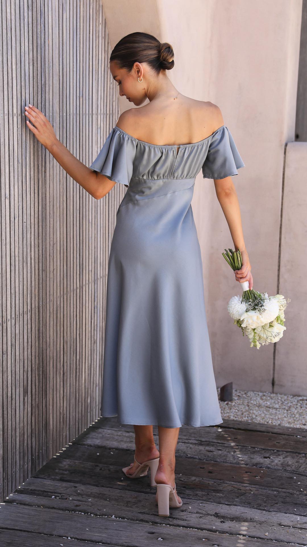 Classic women's off-shoulder maxi dress with charming butterfly sleeves, ideal for evening parties.