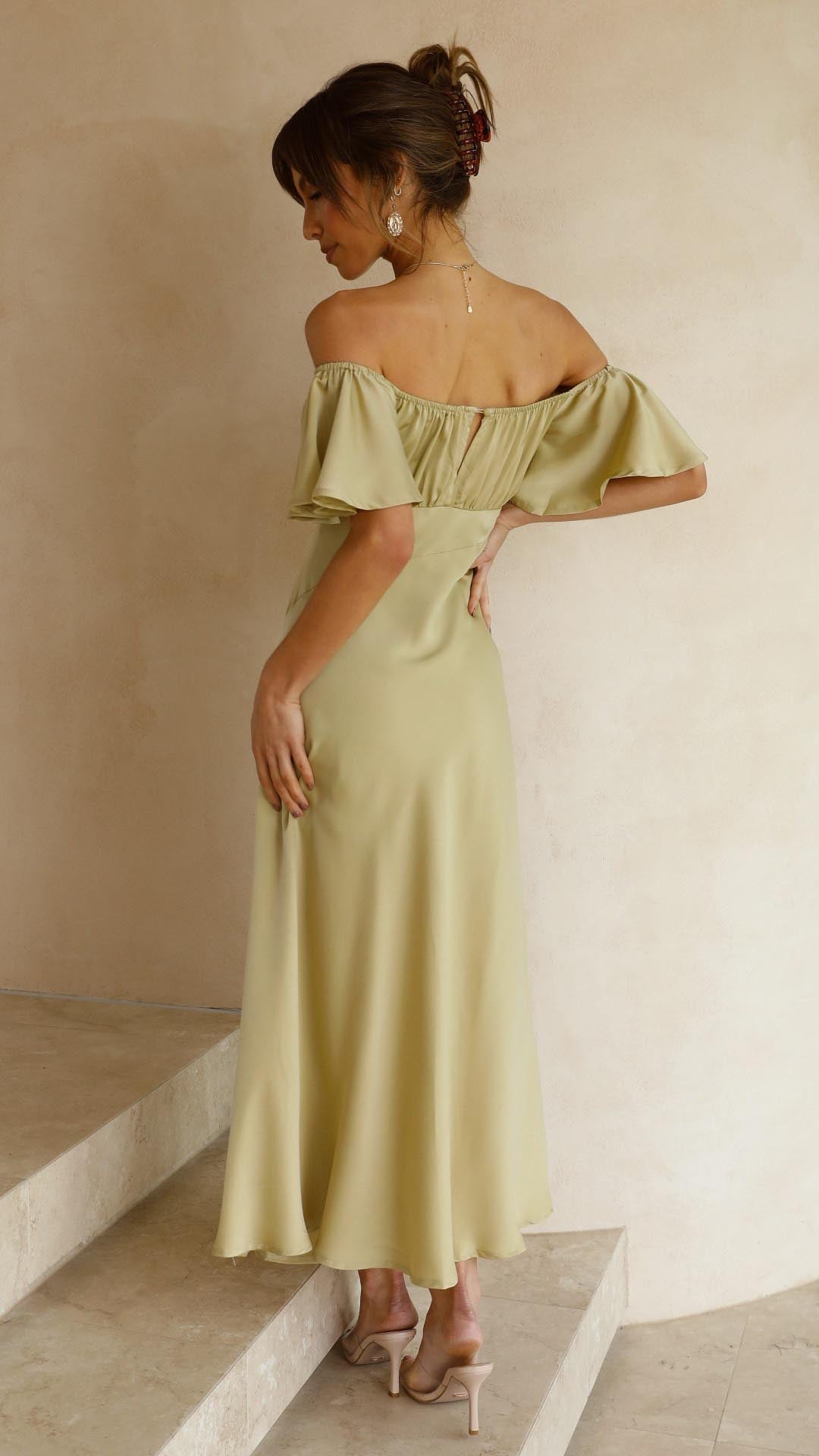 Stunning off-shoulder maxi dress for women, featuring chic butterfly sleeves & flowy design.