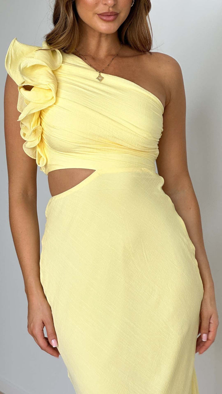 Elegant & modern yellow one-shoulder cutout maxi dress for women, ideal formal occasion wear with frills.
