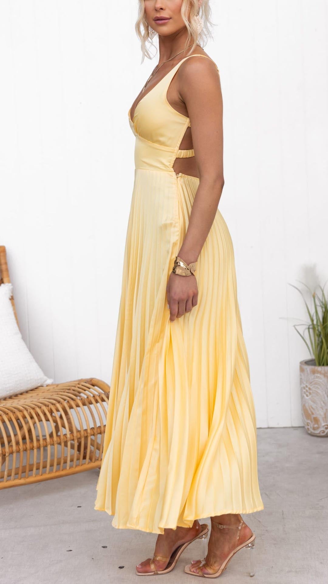Luxurious gold flowy V-neck pleated maxi dress for women, a stunning long summer evening gown.