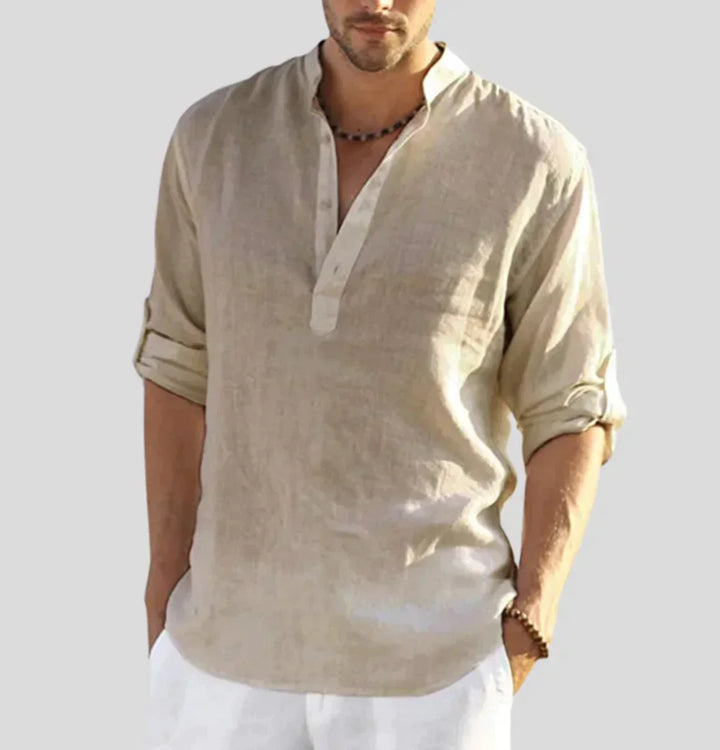 Comfortable long-sleeve men's button-up shirt, ideal for spring & autumn, offering a breathable, classic style.