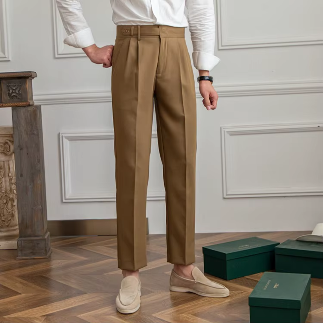 Black pleated chino trousers for men, elegant and suitable for formal settings.
