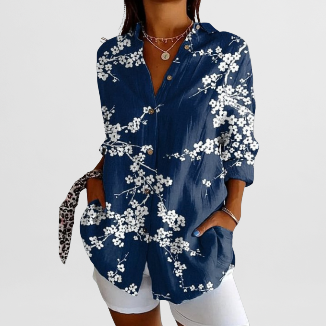 Elegant women's tropical print long sleeve blouse. Loose fit floral top, ideal for spring & summer fashion.