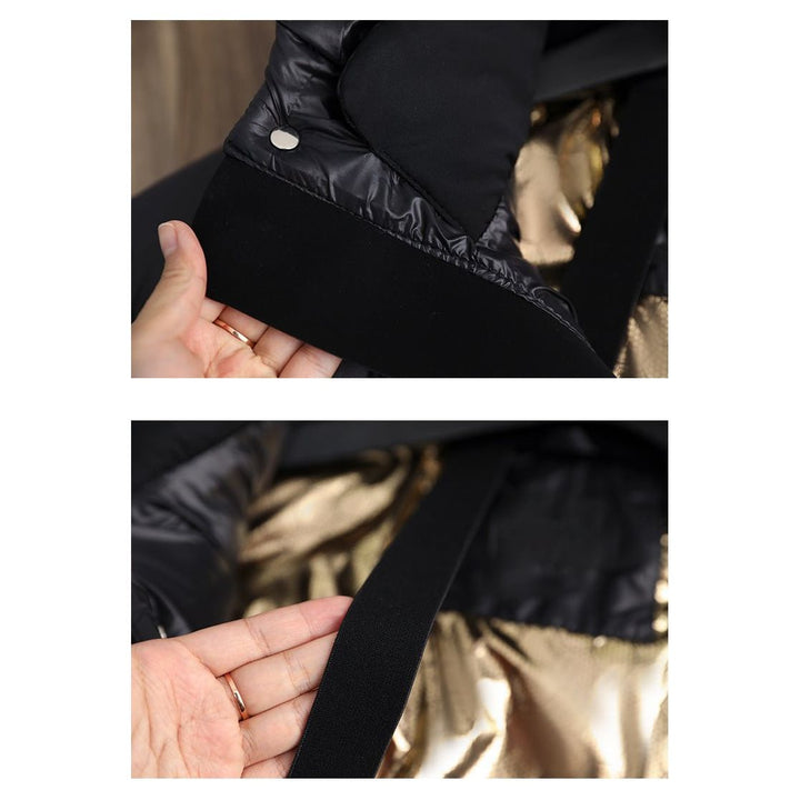 Women's elegant black quilted winter jacket, offering warmth & style with a hood.