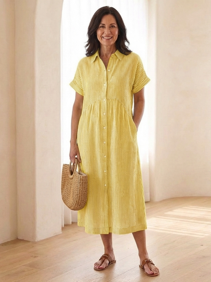 Stylish striped summer midi dress for women, featuring a button front and comfortable short sleeves.