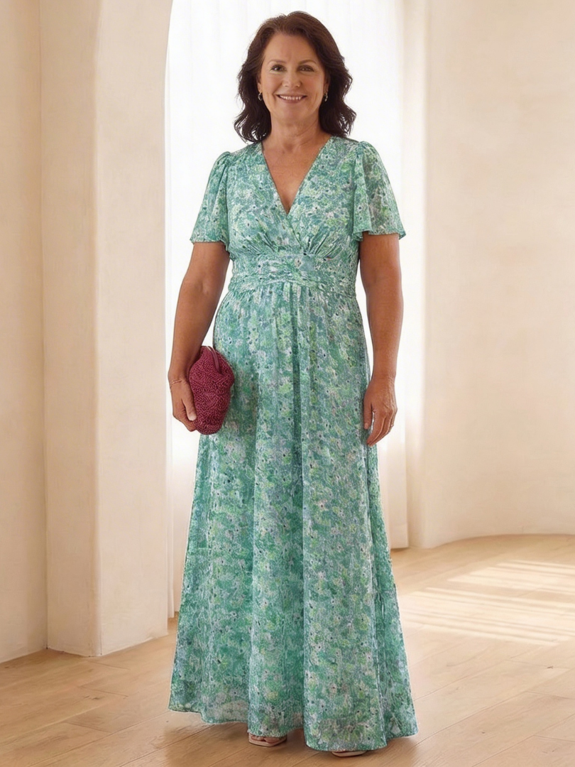 Effortless women's floral maxi dress with V-neck & short sleeves, a chic choice for summer fashion.