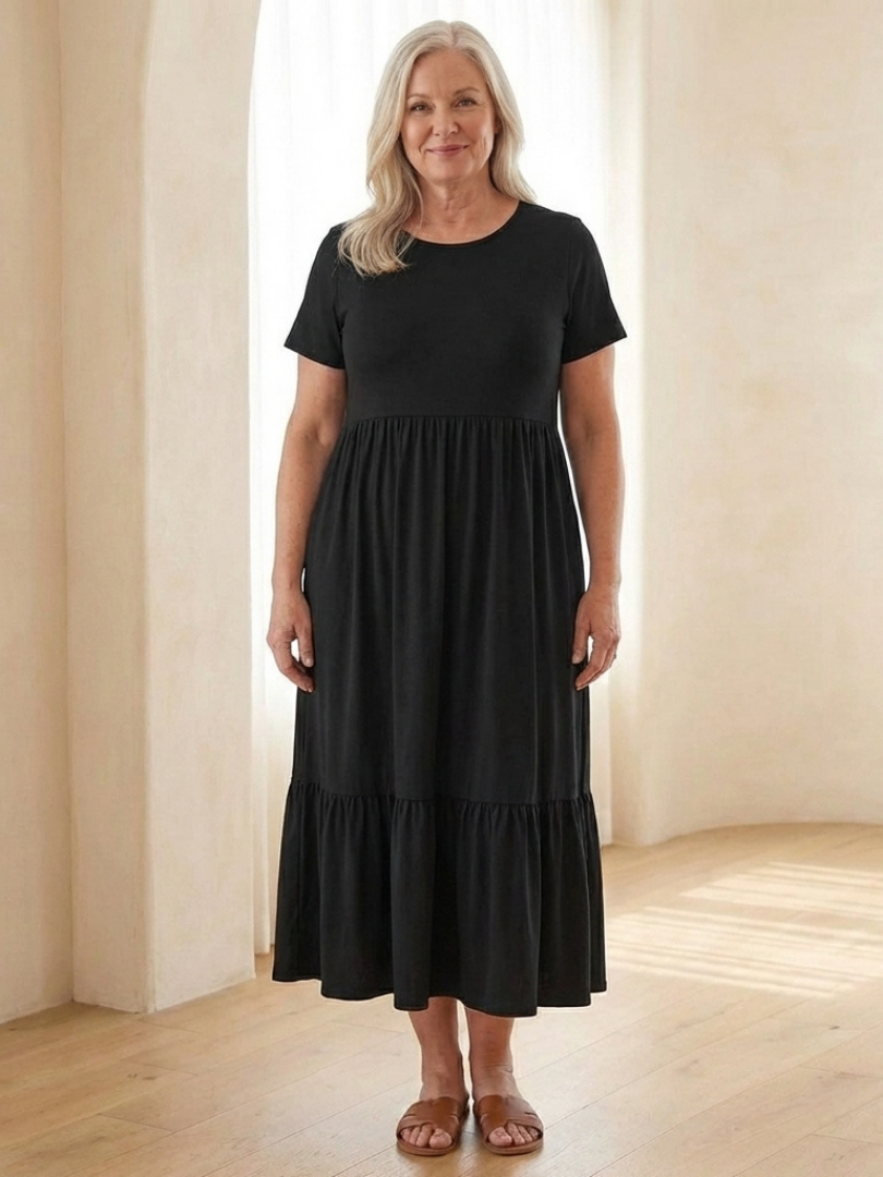 Ladies' casual tiered midi dress with short sleeves & round neck. Ideal for everyday summer fashion. Comfortable.