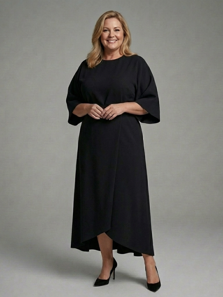 Modern black cape sleeve midi dress for women, waist-defined, with a stylish asymmetric hem. Comfort fit.