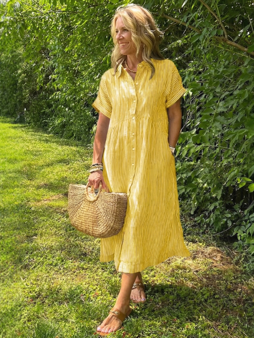 Stylish women's short-sleeve striped midi dress with a functional button front, great for casual summer looks.