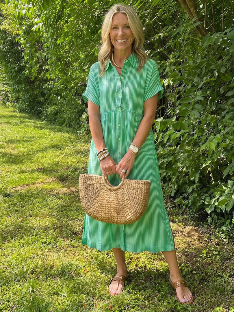 Relaxed fit women's striped button-front midi dress, ideal short-sleeve travel or casual summer outfit.