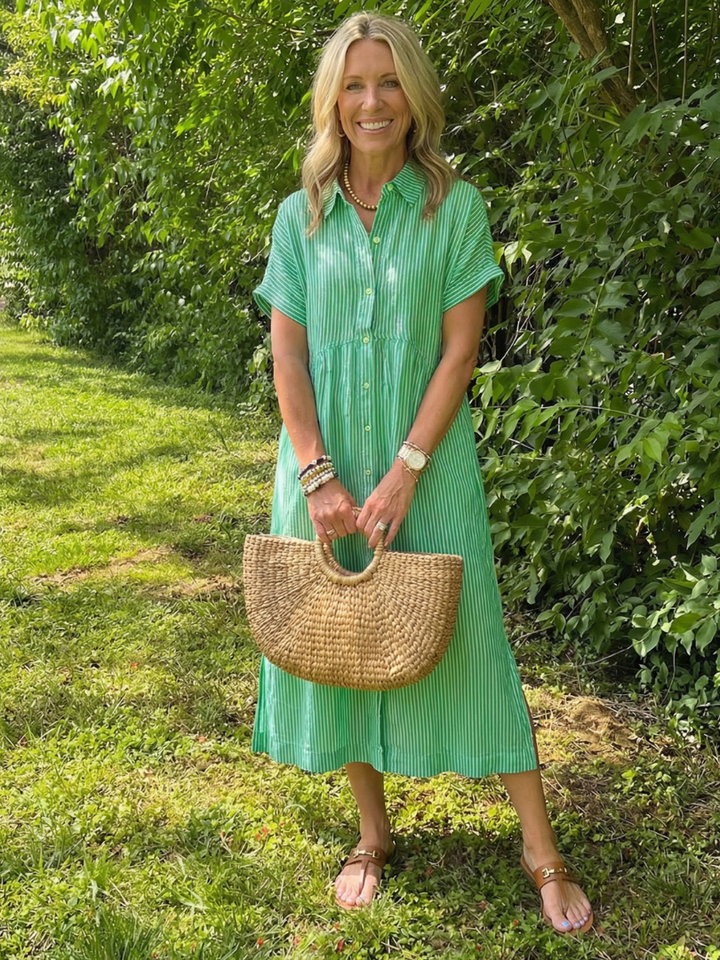 Relaxed fit women's striped button-front midi dress, ideal short-sleeve travel or casual summer outfit.