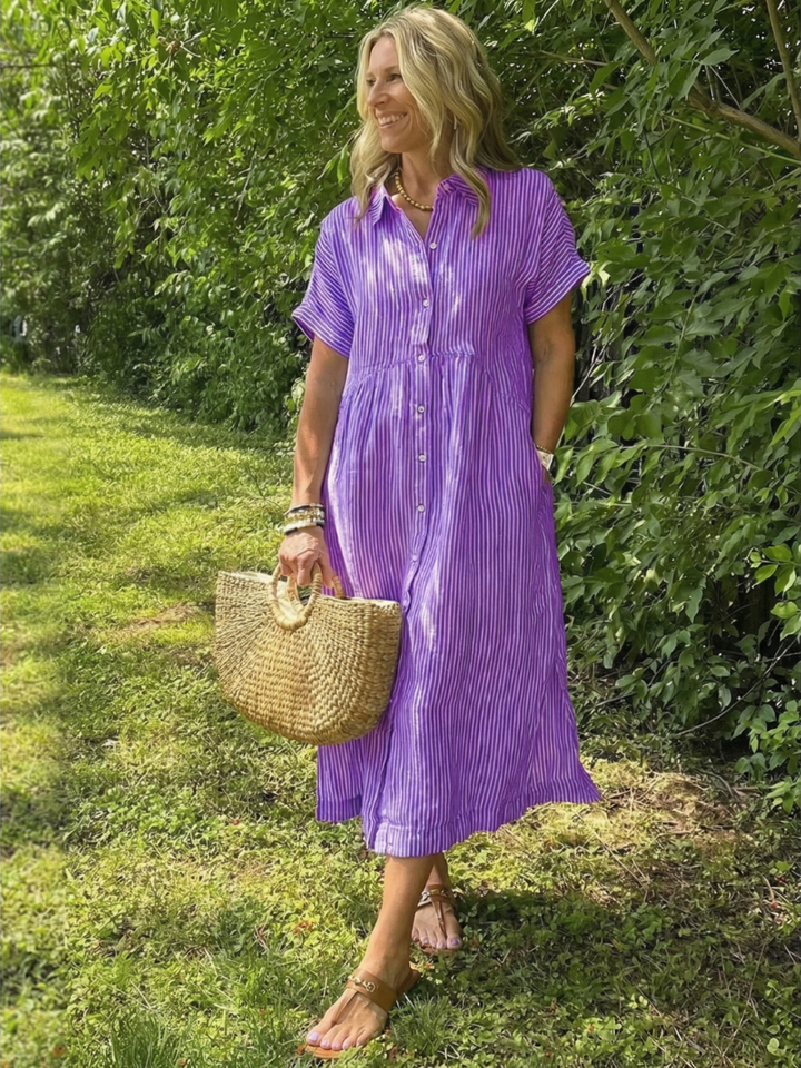 Chic women's striped midi dress, featuring a comfortable short-sleeve & full button front for summer style.