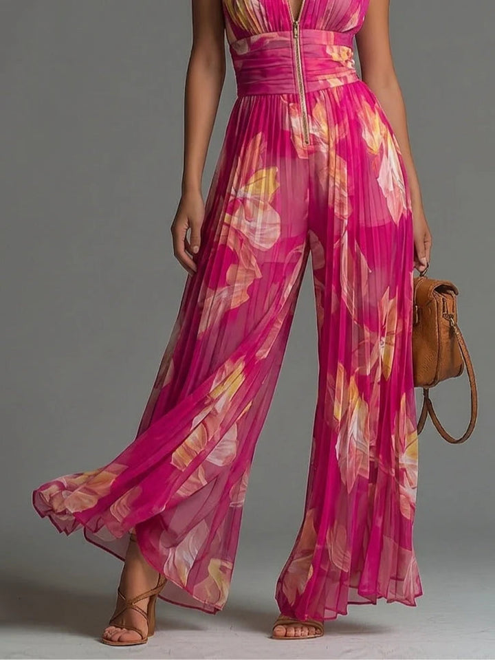 Beautiful women's floral print halter jumpsuit with a wide leg design, suitable for elegant evening wear.