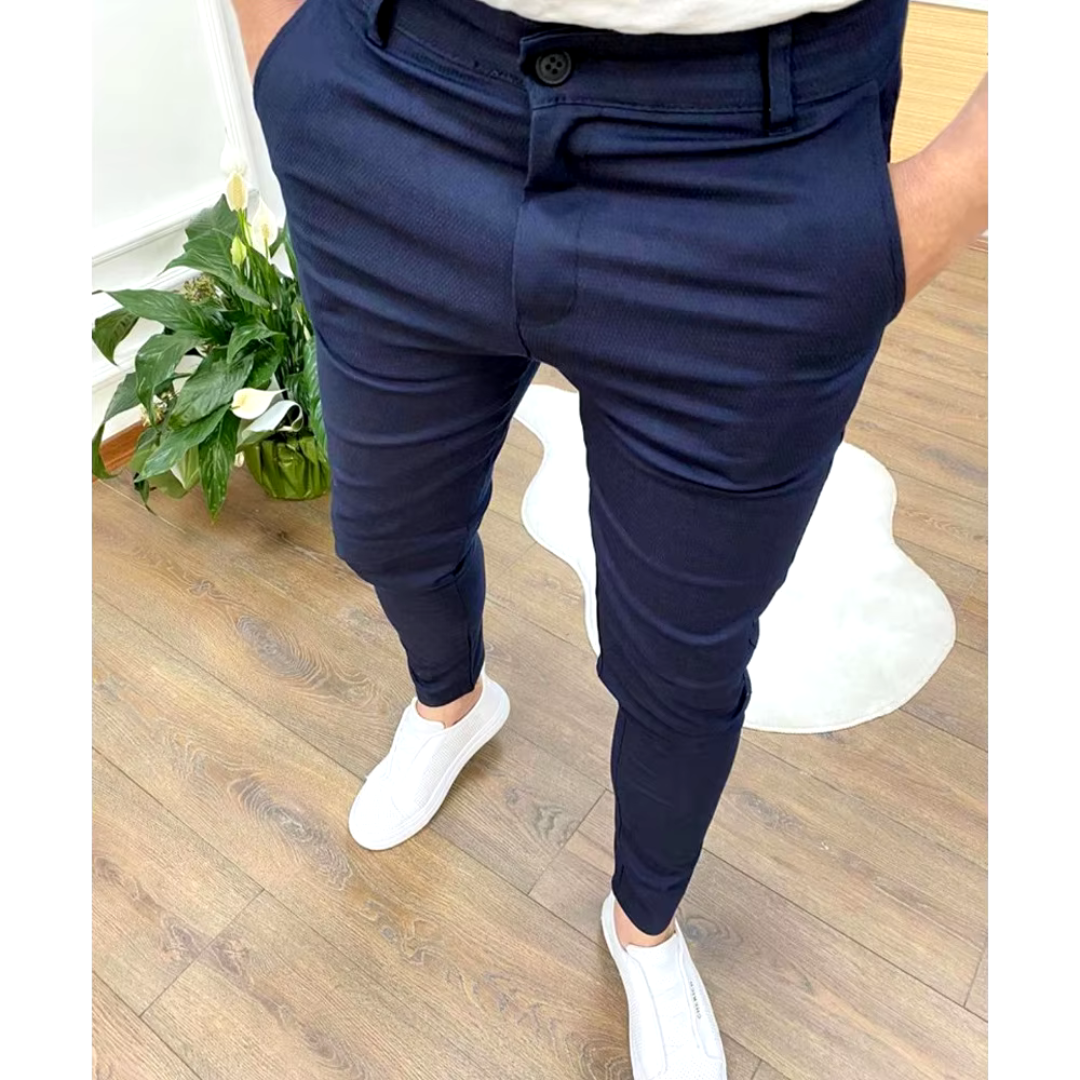 Classic men's chino pants for work or leisure, providing comfort and a sleek, versatile silhouette.