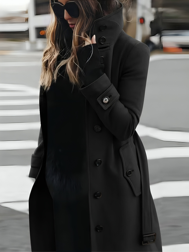 Classic women's belted trench coat; sophisticated high collar & button cuffs. Versatile outerwear for women's fashion.