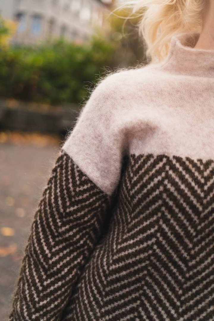 Elegant women's soft turtleneck sweater, perfect for comfort fashion & chic winter style.