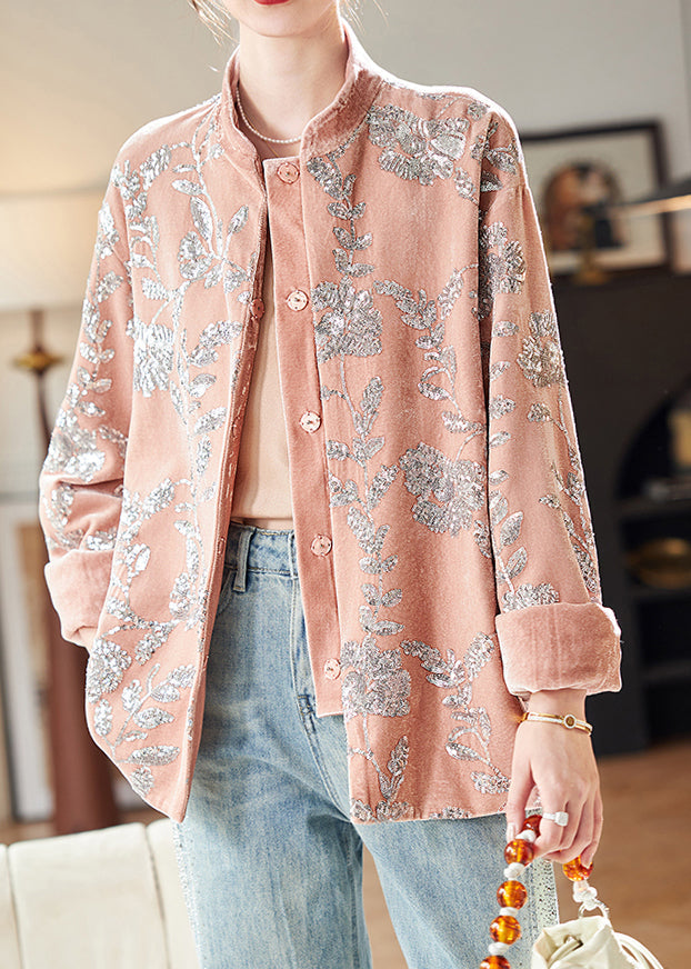 Stylish women's long sleeve coat with chic pink sequin buttons. Ideal elegant party wear or winter fashion jacket.