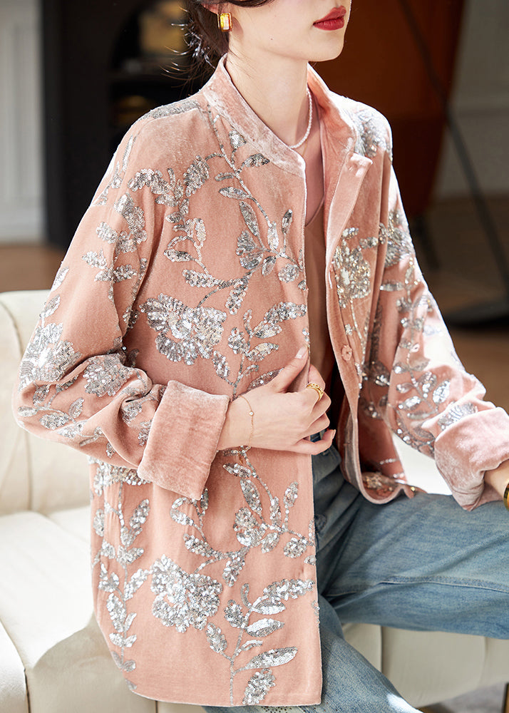 Elegant women's long sleeve coat. Features stylish pink sequin buttons, adding a chic touch to winter outerwear.