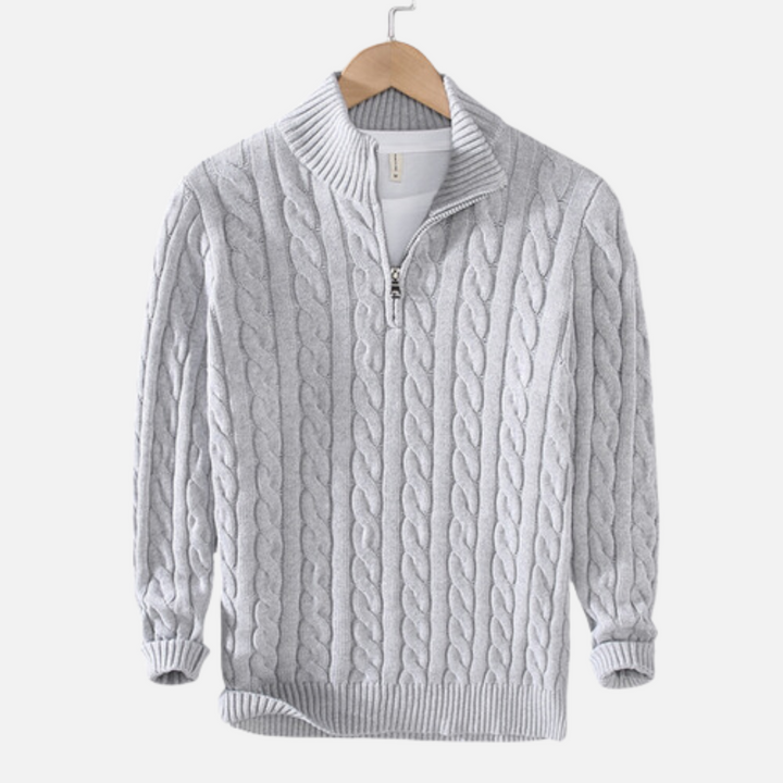 Men's quarter zip cable knit sweater in a refined style, perfect for smart casual layering and comfort.
