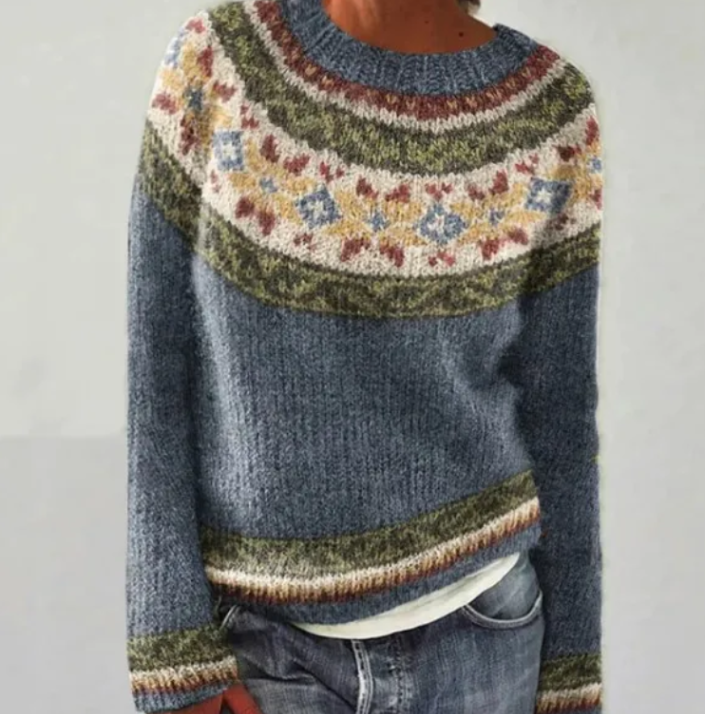 Women's warm Nordic design sweater, a cozy pullover with a unique Scandinavian pattern for winter style.