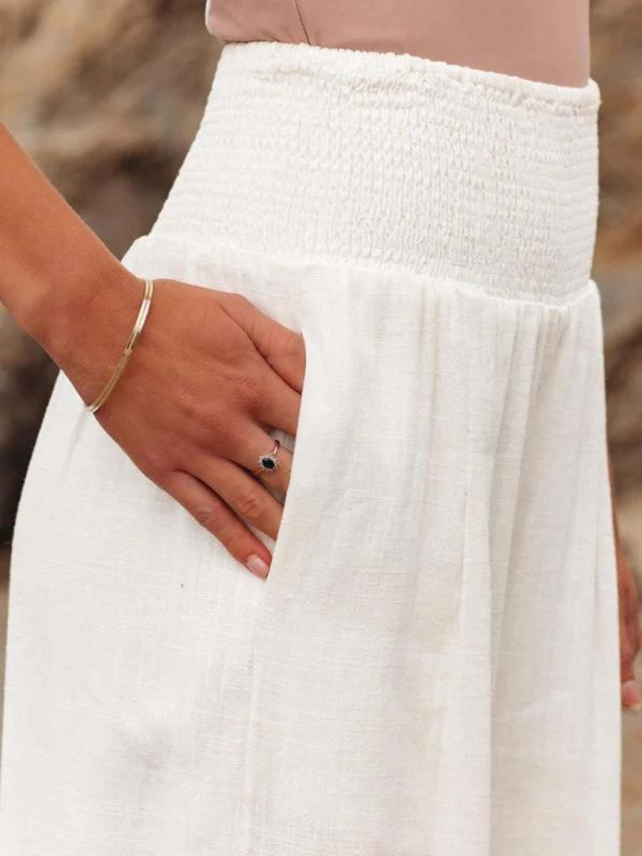 Trendy women's wide leg casual pants, offering a comfortable, flowy fit for beachwear, travel, and summer style.