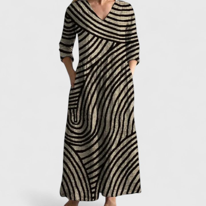 Stylish women's geometric print midi dress with a V-neck, perfect for comfortable spring & summer casual wear.