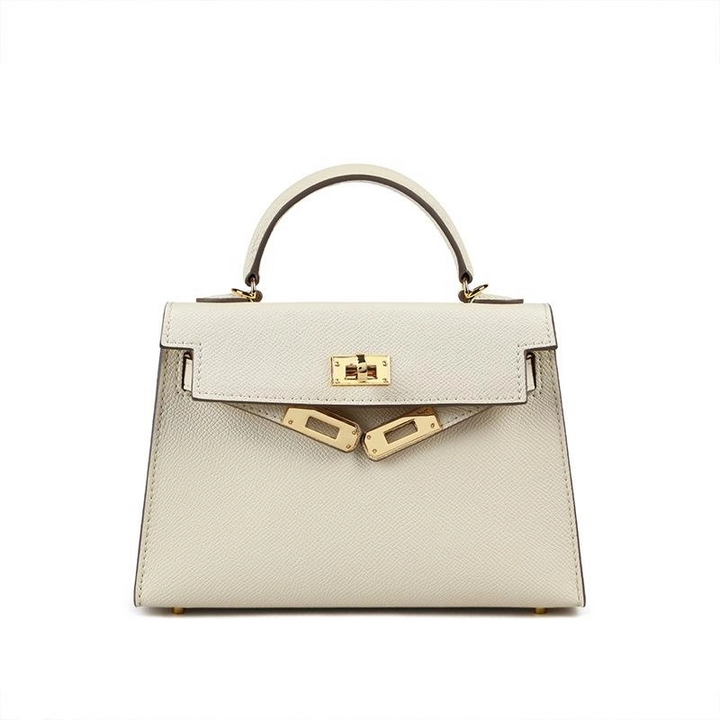 Elegant black structured purse with a strong top handle and eye-catching gold lock. A timeless women's accessory.